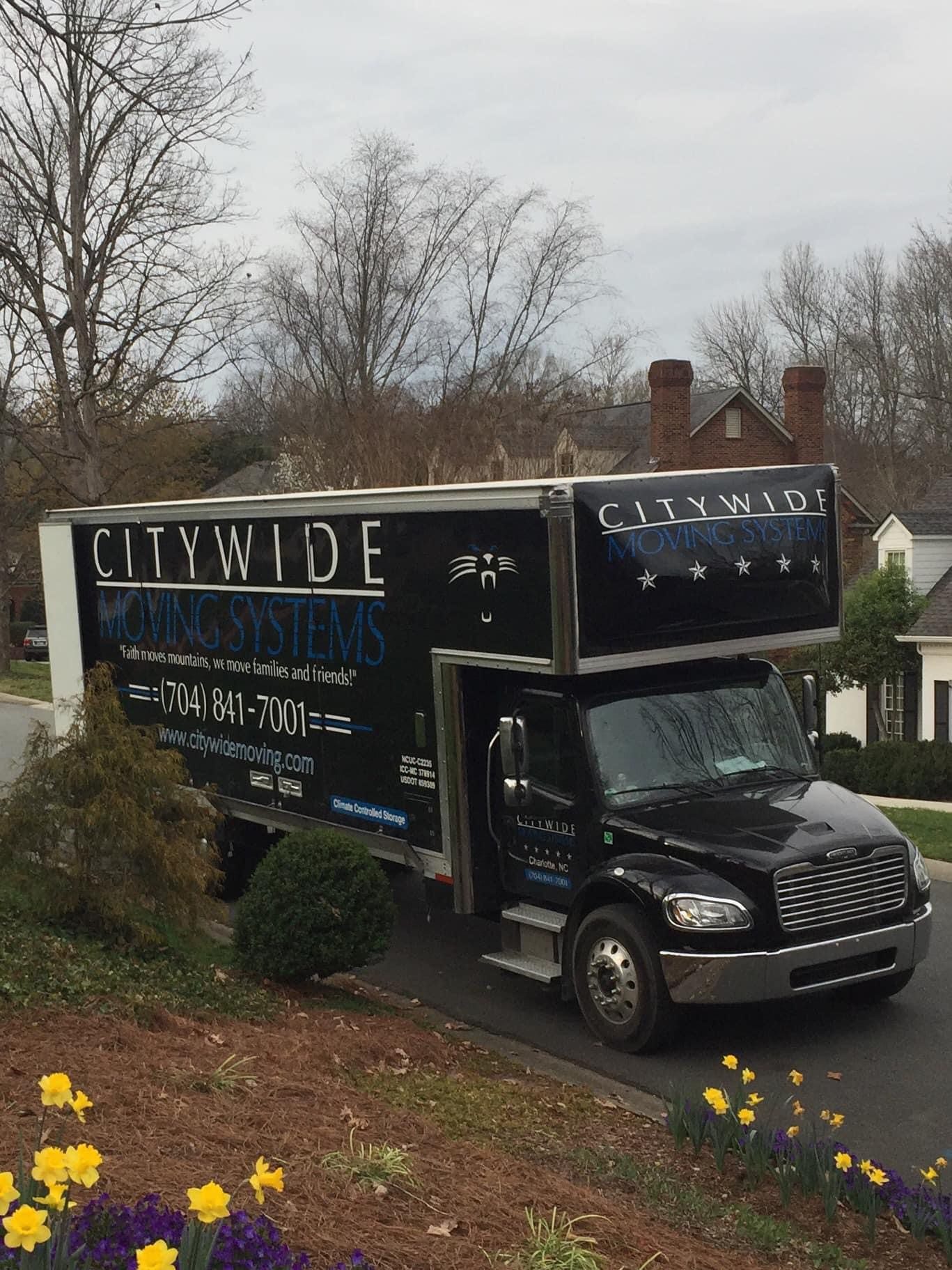 Citywide Moving Systems branded truck in Charlotte NC neighborhood